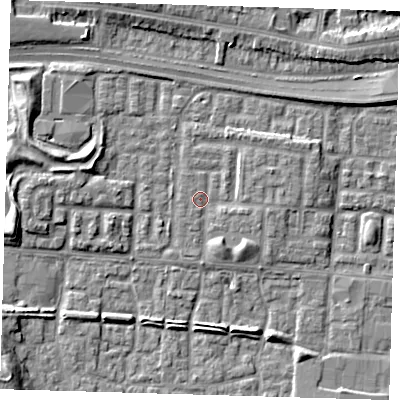 Shaded relief map of the ground around E65JZ, computed from Environment Agency LiDAR. The ground here sits at about 1 m above sea level and falls 7 m across the surrounding 800 m. Surface water reaching this point runs off ground lying to the west, 0.7 m higher.