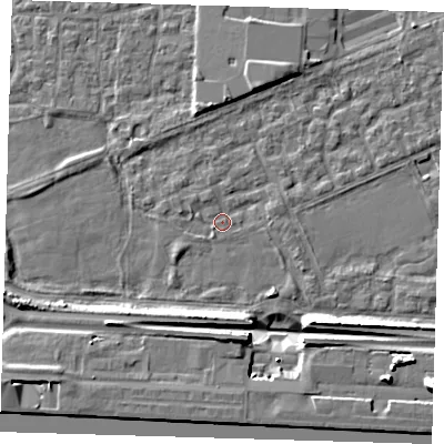 Shaded relief map of the ground around E65QN, computed from Environment Agency LiDAR. The ground here sits at about 2 m above sea level and falls 11 m across the surrounding 800 m. Surface water reaching this point runs off ground lying to the north-north-west, 1.3 m higher.