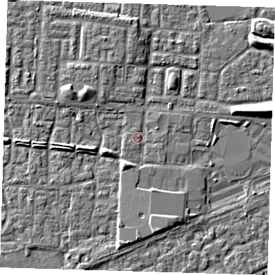 Shaded relief map of the ground around E65RH, computed from Environment Agency LiDAR. The ground here sits at about 2 m above sea level and falls 6 m across the surrounding 800 m. Surface water reaching this point runs off ground lying to the east-north-east, 1.1 m higher.