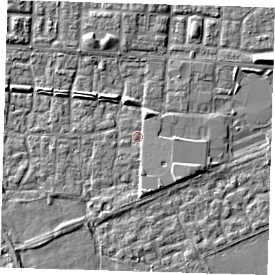 Shaded relief map of the ground around E65RP, computed from Environment Agency LiDAR. The ground here sits at about 1 m above sea level and falls 6 m across the surrounding 800 m. Surface water reaching this point runs off ground lying to the south-east, 3.8 m higher.