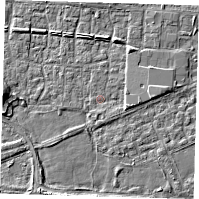 Shaded relief map of the ground around E65RT, computed from Environment Agency LiDAR. The ground here sits at about 1 m above sea level and falls 7 m across the surrounding 800 m. Surface water reaching this point runs off ground lying to the east, 3.9 m higher.