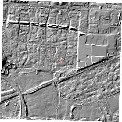 Shaded relief map of the ground around E65RU, computed from Environment Agency LiDAR. The ground here sits at about 1 m above sea level and falls 8 m across the surrounding 800 m. Surface water reaching this point runs off ground lying to the north, 0.6 m higher.