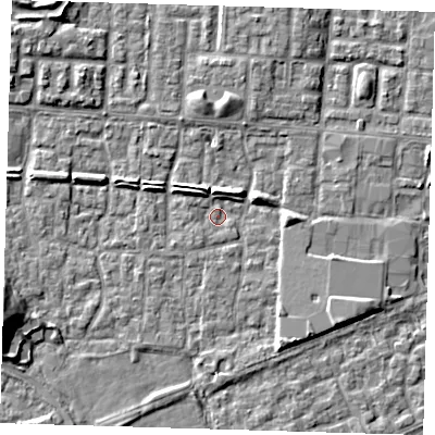 Shaded relief map of the ground around E65RZ, computed from Environment Agency LiDAR. The ground here sits at about 1 m above sea level and falls 9 m across the surrounding 800 m. Surface water reaching this point runs off ground lying to the south-east, 4.7 m higher.