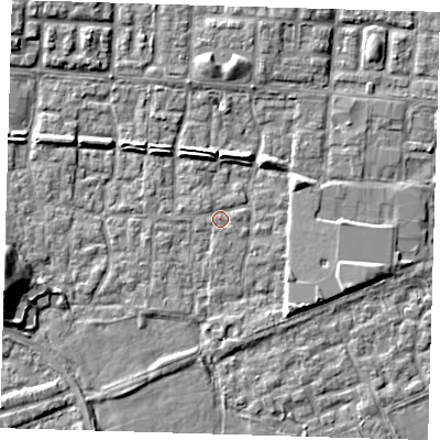 Shaded relief map of the ground around E65SA, computed from Environment Agency LiDAR. The ground here sits at about 1 m above sea level and falls 9 m across the surrounding 800 m. Surface water reaching this point runs off ground lying to the east-south-east, 3.9 m higher.