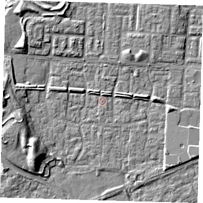 Shaded relief map of the ground around E65SD, computed from Environment Agency LiDAR. The ground here sits at about 1 m above sea level and falls 9 m across the surrounding 800 m. Surface water reaching this point runs off ground lying to the west-south-west, 8.8 m higher.