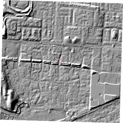 Shaded relief map of the ground around E65SE, computed from Environment Agency LiDAR. The ground here sits at about 1 m above sea level and falls 9 m across the surrounding 800 m. Surface water reaching this point runs off ground lying to the south-east, 4.7 m higher.