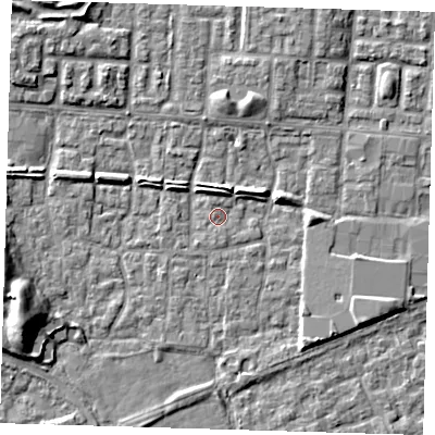 Shaded relief map of the ground around E65SF, computed from Environment Agency LiDAR. The ground here sits at about 1 m above sea level and falls 9 m across the surrounding 800 m. Surface water reaching this point runs off ground lying to the south-east, 4.7 m higher.