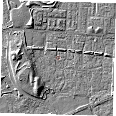 Shaded relief map of the ground around E65SH, computed from Environment Agency LiDAR. The ground here sits at about 1 m above sea level and falls 9 m across the surrounding 800 m. Surface water reaching this point runs off ground lying to the north-east, 2.3 m higher.