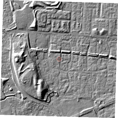Shaded relief map of the ground around E65SJ, computed from Environment Agency LiDAR. The ground here sits at about 1 m above sea level and falls 9 m across the surrounding 800 m. Surface water reaching this point runs off ground lying to the north-east, 2.2 m higher.