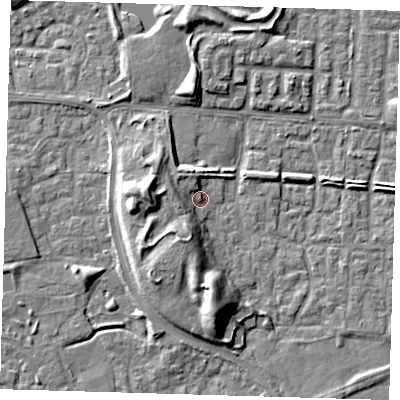 Shaded relief map of the ground around E65ST, computed from Environment Agency LiDAR. The ground here sits at about 2 m above sea level and falls 10 m across the surrounding 800 m. Surface water reaching this point runs off ground lying to the west, 6.5 m higher.