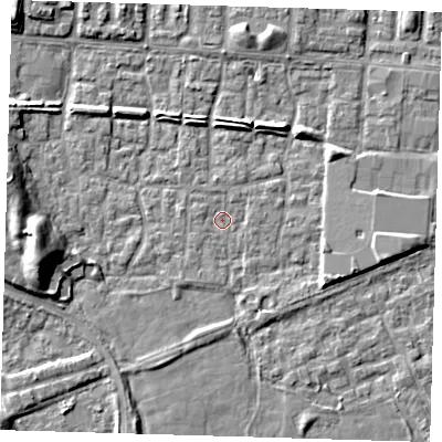 Shaded relief map of the ground around E65SX, computed from Environment Agency LiDAR. The ground here sits at about 1 m above sea level and falls 9 m across the surrounding 800 m. Surface water reaching this point runs off ground lying to the east-south-east, 3.9 m higher.