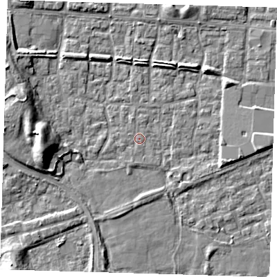 Shaded relief map of the ground around E65TA, computed from Environment Agency LiDAR. The ground here sits at about 1 m above sea level and falls 9 m across the surrounding 800 m. Surface water reaching this point runs off ground lying to the west-south-west, 0.7 m higher.