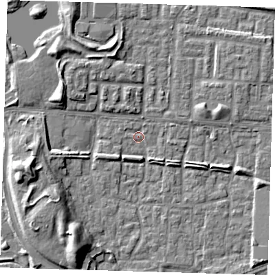 Shaded relief map of the ground around E65TH, computed from Environment Agency LiDAR. The ground here sits at about 1 m above sea level and falls 9 m across the surrounding 800 m. Surface water reaching this point runs off ground lying to the west-south-west, 8.9 m higher.