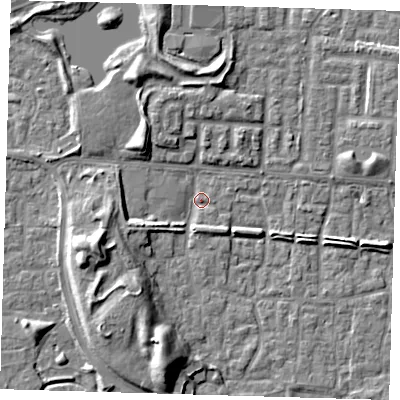 Shaded relief map of the ground around E65TJ, computed from Environment Agency LiDAR. The ground here sits at about 1 m above sea level and falls 9 m across the surrounding 800 m. Surface water reaching this point runs off ground lying to the south-south-west, 8.8 m higher.
