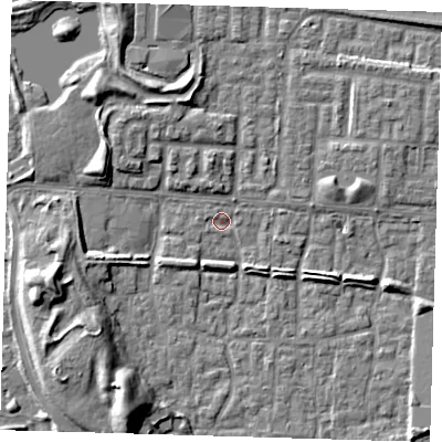 Shaded relief map of the ground around E65TN, computed from Environment Agency LiDAR. The ground here sits at about 1 m above sea level and falls 9 m across the surrounding 800 m. Surface water reaching this point runs off ground lying to the south-south-west, 2.7 m higher.