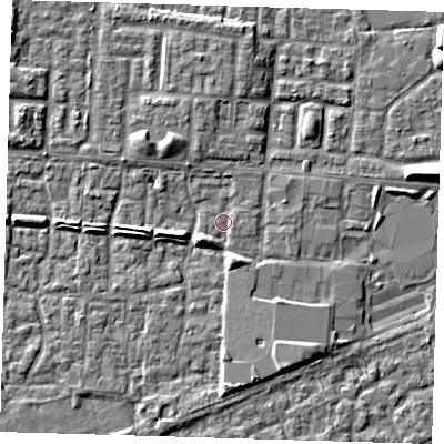 Shaded relief map of the ground around E65TR, computed from Environment Agency LiDAR. The ground here sits at about 1 m above sea level and falls 6 m across the surrounding 800 m. Surface water reaching this point runs off ground lying to the south-south-west, 1.6 m higher.