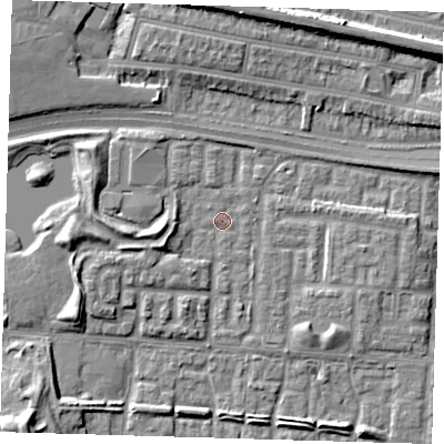 Shaded relief map of the ground around E65TZ, computed from Environment Agency LiDAR. The ground here sits at about 1 m above sea level and falls 9 m across the surrounding 800 m. Surface water reaching this point runs off ground lying to the west, 4.4 m higher.