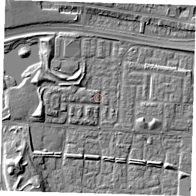 Shaded relief map of the ground around E65UA, computed from Environment Agency LiDAR. The ground here sits at about 2 m above sea level and falls 9 m across the surrounding 800 m. Surface water reaching this point runs off ground lying to the north-west, 4.4 m higher.
