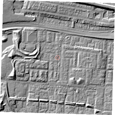 Shaded relief map of the ground around E65UE, computed from Environment Agency LiDAR. The ground here sits at about 1 m above sea level and falls 9 m across the surrounding 800 m. Surface water reaching this point runs off ground lying to the east-north-east, 3.2 m higher.