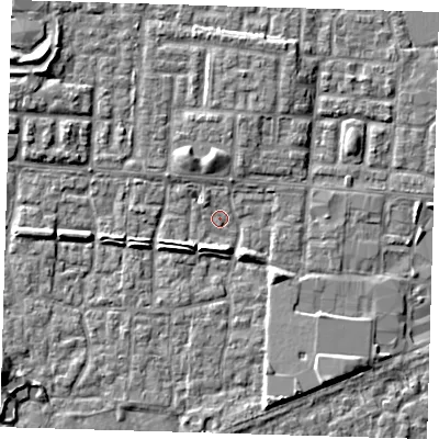 Shaded relief map of the ground around E65UR, computed from Environment Agency LiDAR. The ground here sits at about 1 m above sea level and falls 6 m across the surrounding 800 m. Surface water reaching this point runs off ground lying to the north, 3.9 m higher.