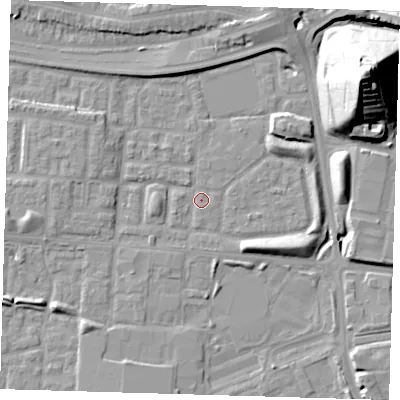 Shaded relief map of the ground around E65XG, computed from Environment Agency LiDAR. The ground here sits at about 2 m above sea level and falls 36 m across the surrounding 800 m. Surface water reaching this point runs off ground lying to the east-south-east, 5.3 m higher.