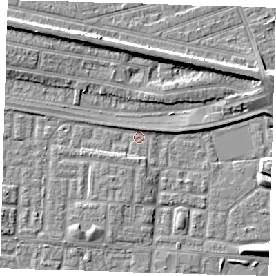 Shaded relief map of the ground around E65YJ, computed from Environment Agency LiDAR. The ground here sits at about 1 m above sea level and falls 10 m across the surrounding 800 m. Surface water reaching this point runs off ground lying to the south, 2.4 m higher.