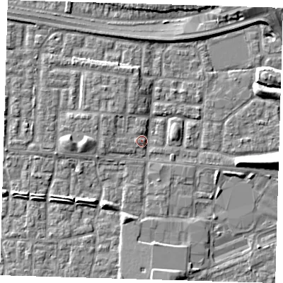 Shaded relief map of the ground around E65YN, computed from Environment Agency LiDAR. The ground here sits at about 2 m above sea level and falls 7 m across the surrounding 800 m. Surface water reaching this point runs off ground lying to the north-west, 2.2 m higher.