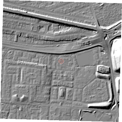 Shaded relief map of the ground around E65YX, computed from Environment Agency LiDAR. The ground here sits at about 1 m above sea level and falls 23 m across the surrounding 800 m. Surface water reaching this point runs off ground lying to the east, 22.7 m higher.