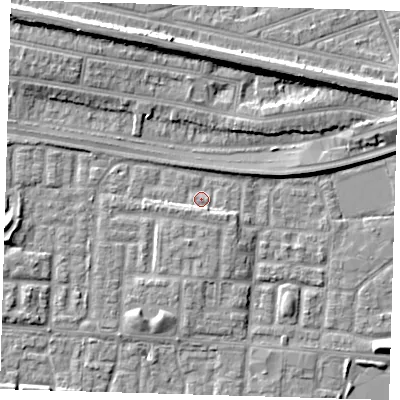 Shaded relief map of the ground around E65ZH, computed from Environment Agency LiDAR. The ground here sits at about 2 m above sea level and falls 9 m across the surrounding 800 m. Surface water reaching this point runs off ground lying to the south-south-east, 2.6 m higher.