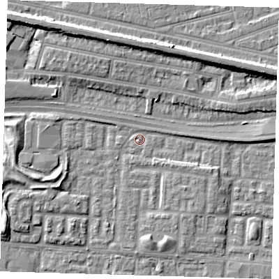 Shaded relief map of the ground around E65ZL, computed from Environment Agency LiDAR. The ground here sits at about 1 m above sea level and falls 9 m across the surrounding 800 m. Surface water reaching this point runs off ground lying to the east-south-east, 3.2 m higher.