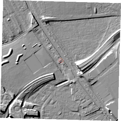 Shaded relief map of the ground around E95HS, computed from Environment Agency LiDAR. The ground here sits at about 7 m above sea level and falls 11 m across the surrounding 800 m. Surface water reaching this point runs off ground lying to the west-south-west, 7.9 m higher.