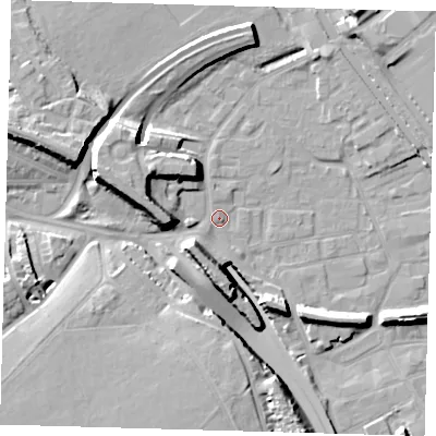 Shaded relief map of the ground around E95JB, computed from Environment Agency LiDAR. The ground here sits at about 6 m above sea level and falls 17 m across the surrounding 800 m. Surface water reaching this point runs off ground lying to the west-north-west, 11.1 m higher.