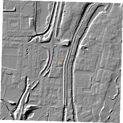Shaded relief map of the ground around EN36HR, computed from Environment Agency LiDAR. The ground here sits at about 16 m above sea level and falls 9 m across the surrounding 800 m. Surface water reaching this point runs off ground lying to the north-north-east, 6.5 m higher.