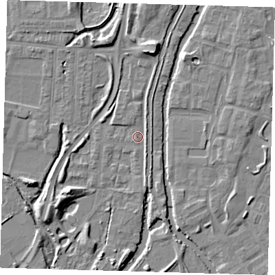 Shaded relief map of the ground around EN36HT, computed from Environment Agency LiDAR. The ground here sits at about 16 m above sea level and falls 9 m across the surrounding 800 m. Surface water reaching this point runs off ground lying to the north, 7.6 m higher.