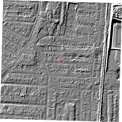 Shaded relief map of the ground around EN36ST, computed from Environment Agency LiDAR. The ground here sits at about 18 m above sea level and falls 7 m across the surrounding 800 m. Surface water reaching this point runs off ground lying to the north-north-west, 2.7 m higher.