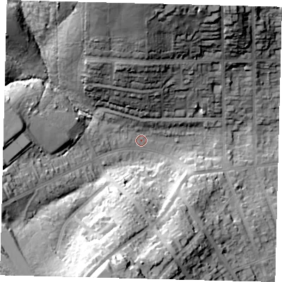 Shaded relief map of the ground around EN55LD, computed from Environment Agency LiDAR. The ground here sits at about 74 m above sea level and falls 41 m across the surrounding 800 m. Surface water reaching this point runs off ground lying to the north-north-west, 36.8 m higher.
