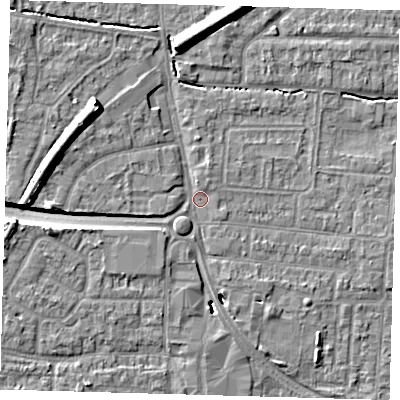 Shaded relief map of the ground around EN87DR, computed from Environment Agency LiDAR. The ground here sits at about 21 m above sea level and falls 11 m across the surrounding 800 m. Surface water reaching this point runs off ground lying to the north-west, 7.8 m higher.