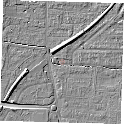 Shaded relief map of the ground around EN87EF, computed from Environment Agency LiDAR. The ground here sits at about 21 m above sea level and falls 11 m across the surrounding 800 m. Surface water reaching this point runs off ground lying to the west, 2.2 m higher.