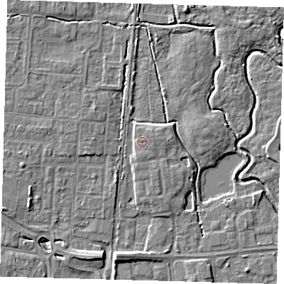 Shaded relief map of the ground around EN87FJ, computed from Environment Agency LiDAR. The ground here sits at about 20 m above sea level and falls 8 m across the surrounding 800 m. Surface water reaching this point runs off ground lying to the east-north-east, 0.7 m higher.