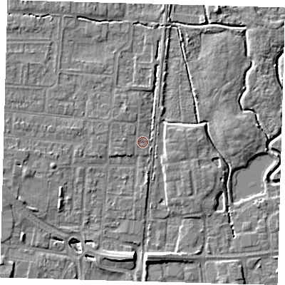 Shaded relief map of the ground around EN87JB, computed from Environment Agency LiDAR. The ground here sits at about 19 m above sea level and falls 8 m across the surrounding 800 m. Surface water reaching this point runs off ground lying to the west, 1.0 m higher.