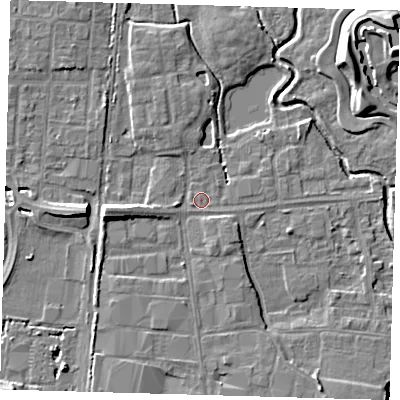 Shaded relief map of the ground around EN87NB, computed from Environment Agency LiDAR. The ground here sits at about 19 m above sea level and falls 10 m across the surrounding 800 m. Surface water reaching this point runs off ground lying to the west, 6.1 m higher.