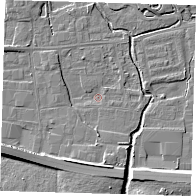 Shaded relief map of the ground around EN87QG, computed from Environment Agency LiDAR. The ground here sits at about 18 m above sea level and falls 11 m across the surrounding 800 m. Surface water reaching this point runs off ground lying to the south, 7.1 m higher.