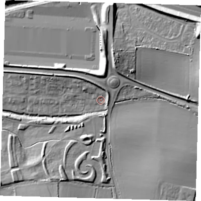 Shaded relief map of the ground around EN93YX, computed from Environment Agency LiDAR. The ground here sits at about 21 m above sea level and falls 14 m across the surrounding 800 m. Surface water reaching this point runs off ground lying to the north-north-west, 4.9 m higher.