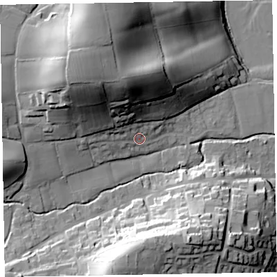 Shaded relief map of the ground around EX100DH, computed from Environment Agency LiDAR. The ground here sits at about 33 m above sea level and falls 42 m across the surrounding 800 m. Surface water reaching this point runs off ground lying to the north-west, 33.1 m higher.