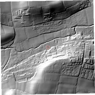 Shaded relief map of the ground around EX100DR, computed from Environment Agency LiDAR. The ground here sits at about 32 m above sea level and falls 48 m across the surrounding 800 m. Surface water reaching this point runs off ground lying to the south, 27.1 m higher.