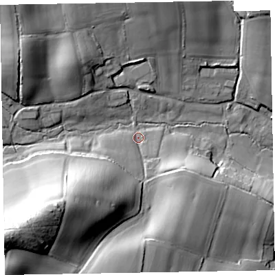 Shaded relief map of the ground around EX100HS, computed from Environment Agency LiDAR. The ground here sits at about 34 m above sea level and falls 44 m across the surrounding 800 m. Surface water reaching this point runs off ground lying to the south-west, 38.6 m higher.
