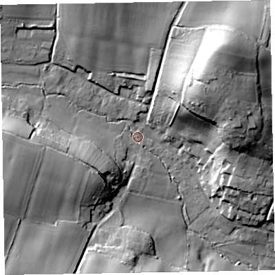 Shaded relief map of the ground around EX100LB, computed from Environment Agency LiDAR. The ground here sits at about 26 m above sea level and falls 44 m across the surrounding 800 m. Surface water reaching this point runs off ground lying to the west-south-west, 21.2 m higher.
