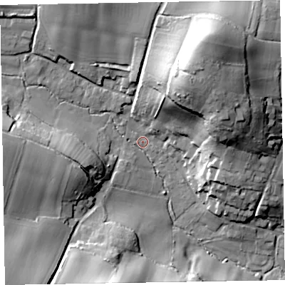 Shaded relief map of the ground around EX100LF, computed from Environment Agency LiDAR. The ground here sits at about 25 m above sea level and falls 46 m across the surrounding 800 m. Surface water reaching this point runs off ground lying to the south-west, 21.9 m higher.