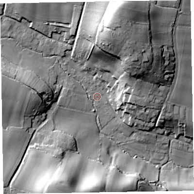 Shaded relief map of the ground around EX100LQ, computed from Environment Agency LiDAR. The ground here sits at about 24 m above sea level and falls 46 m across the surrounding 800 m. Surface water reaching this point runs off ground lying to the south-south-west, 38.7 m higher.