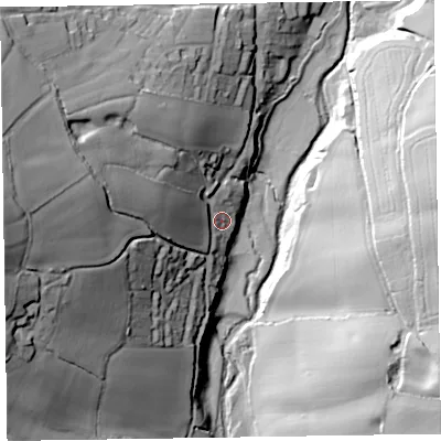 Shaded relief map of the ground around EX100RE, computed from Environment Agency LiDAR. The ground here sits at about 56 m above sea level and falls 68 m across the surrounding 800 m. Surface water reaching this point runs off ground lying to the west-north-west, 31.6 m higher.